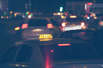 yellow taxi   at night in the city