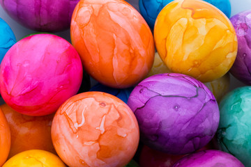 Easter eggs painted in colors on a white background.