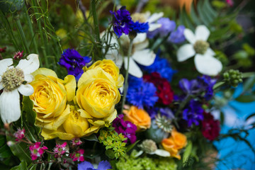 Bouquet of colorful flowers decorates a table