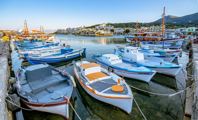 Fototapeta na wymiar The small traditional harbor of Elounda at sunset, Crete, Greece.