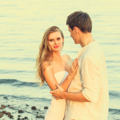 Fototapeta na wymiar Young couple at beach
