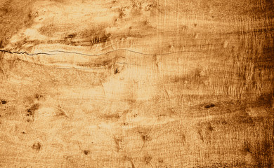 Naklejka premium Rich flat wood texture with warm colors and burled finish. Rough wood surface with cut marks.