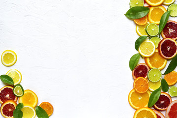 Food background withs slices of variety citrus .Top view with copy space.
