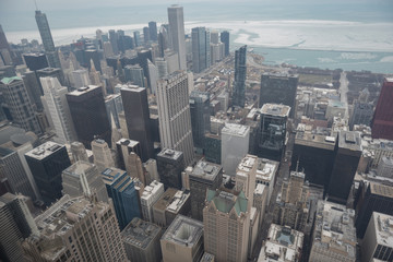 Tall buildings situating near frozen river