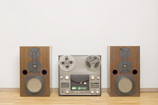 vintage analog magnet tape recorder, big wooden speakers