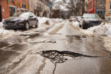 Large pothole in Montreal, Canada.