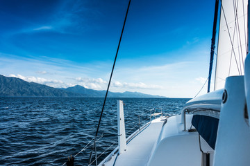 Obraz premium Sailing yacht catamaran sailing in the sea. Sailboat. Sailing.