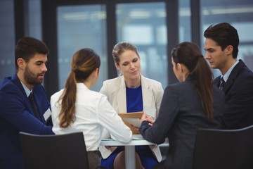 Businesspeople having a discussion in meeting