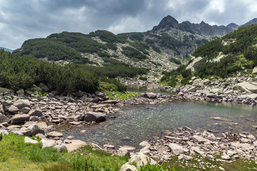 Fototapeta na wymiar Amazing view of Rocky peaks and Upper Muratovo lake, Pirin Mountain, Bulgaria