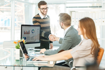  handshake of lawyers before the discussion of the financial conditions of the new contract between the new business partners