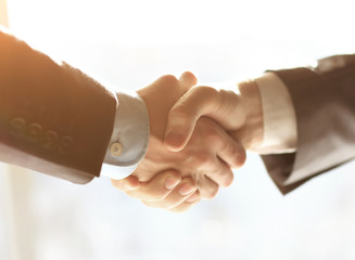 Business people shaking hands, finishing up meeting