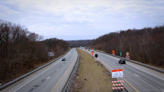 Highway Traffic near construction zone - overpass angle