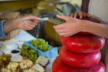 Staff receiving payment from the customer