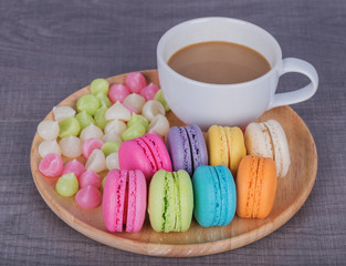 macaron and Aalaw with coffee on wood table