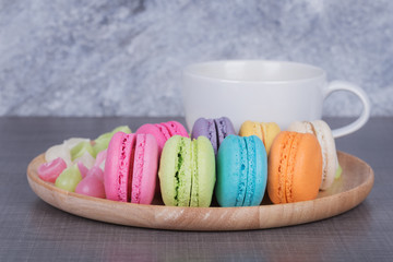 macaron and Aalaw with coffee on wood table