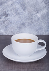 coffee on wood table and wall background
