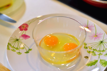 kitchen table with eggs on basket, focus from top view kitchen table.