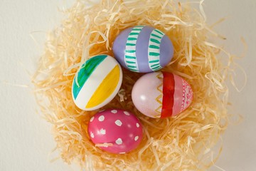 Painted easter eggs in nest