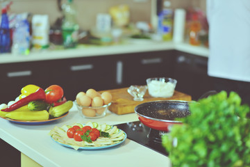 healthy foods are on the table in the kitchen