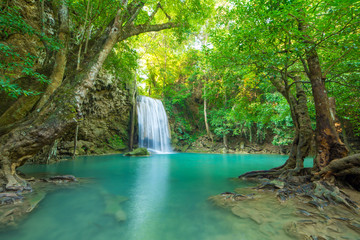 Fototapeta na wymiar Waterfall in Deep forest at Erawan waterfall National Park,