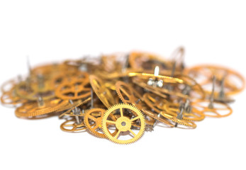 A pile of gear. Many mechanisms. Old vintage gears. Part of clockwork. The natural color and...