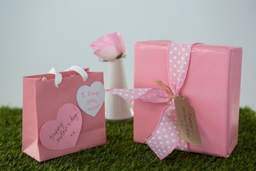 Pink gift bag, gift box with heart shape tag