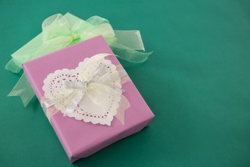 Gift boxes against green background