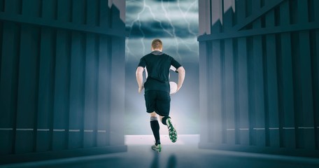 Composite image of rugby player running with a rugby ball 3d