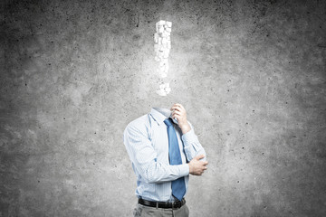 Pensive headless businessman