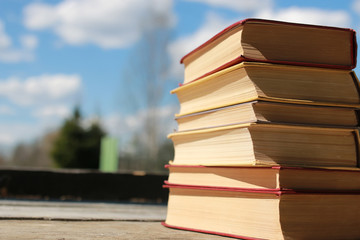 books standing on a table