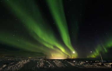 Fototapeta na wymiar Aurora Borealis in Pingvellir National Park, South Iceland