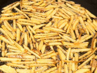 cooking potato fries in oil