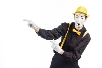 Portrait of a man, an artist, a pantomime. Shows something, isolated on white background