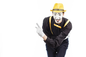 Portrait of a man, an artist, a pantomime. Shows something, isolated on white background