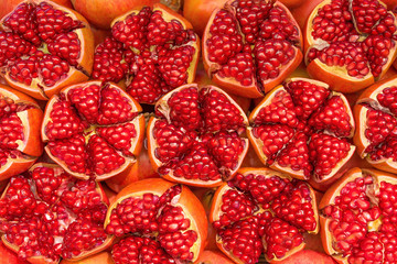 Red pomegranate background, close up