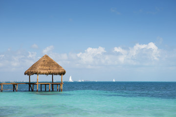 Tropical pier on the shores of Caribbean sea.