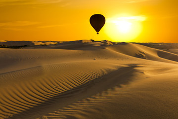 Fototapeta na wymiar Beautiful desert landscape with a colorful sunset