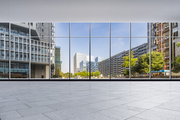 The modern office buildings from glass window