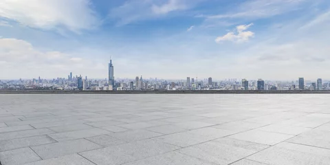  Panoramic skyline and buildings with empty concrete square floor © MyCreative