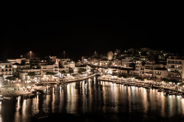 Greek Easter in Crete in Agios Nikolaos. Easter Night at Voulismeni Lake