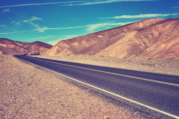 Color stylized desert road in Death Valley, USA.
