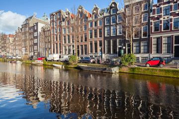 Fototapeta premium Houses along canal in old Amsterdam