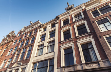 Fototapeta na wymiar Traditional old houses of Amsterdam