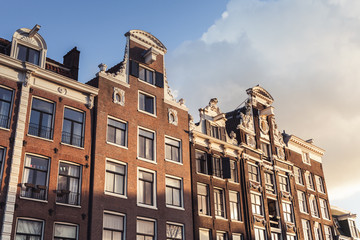Fototapeta na wymiar Traditional living houses of old Amsterdam