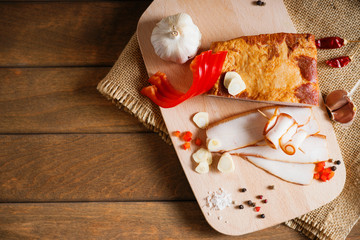 Smoked bacon on a wooden cutting board 