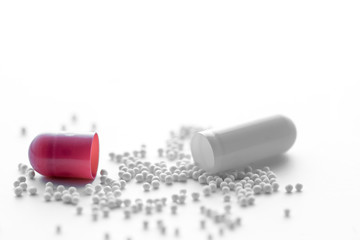 Medical,pharmacy theme background concept.Dark red capsules.