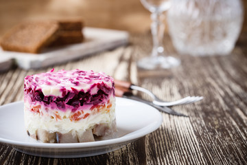 Homemade dressed pickled herring