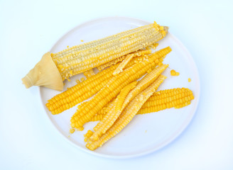 Sliced Boiled sweet corn in white circle plate ready for eat