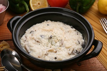 mushroom cream risotto on hot pot