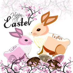 couple of Easter bunnies with eggs and blooming magnolia 